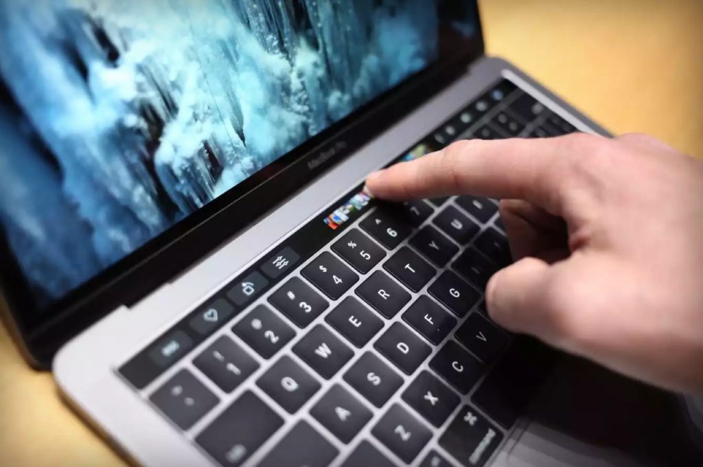 Como adicionar impressões digitais ao Touch ID do MacBook Pro