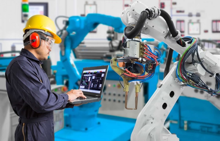 Imagem de robôs a trabalhar na indústria