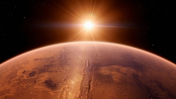 Imagem de Marte com o Sol ao fundo