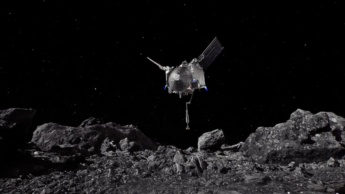 Imagem da nave OSIRIS-REx da NASA a tocar no asteroide Bennu.