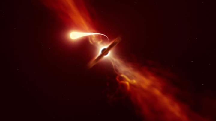 Ilustração da imagem captada do último suspiro de uma estrela devorada por um buraco negro