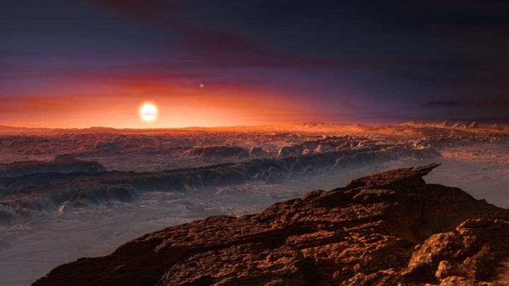 Representação artística do exoplaneta Proxima Centauri b a partir do seu solo rochoso