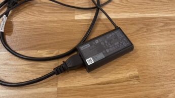 Caixa do cabo de um carregador de um computador portátil