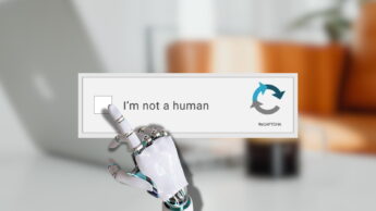 Mão robótica a clicar numa mensagem CAPTCHA, onde se lê, em inglês, "não sou humano".